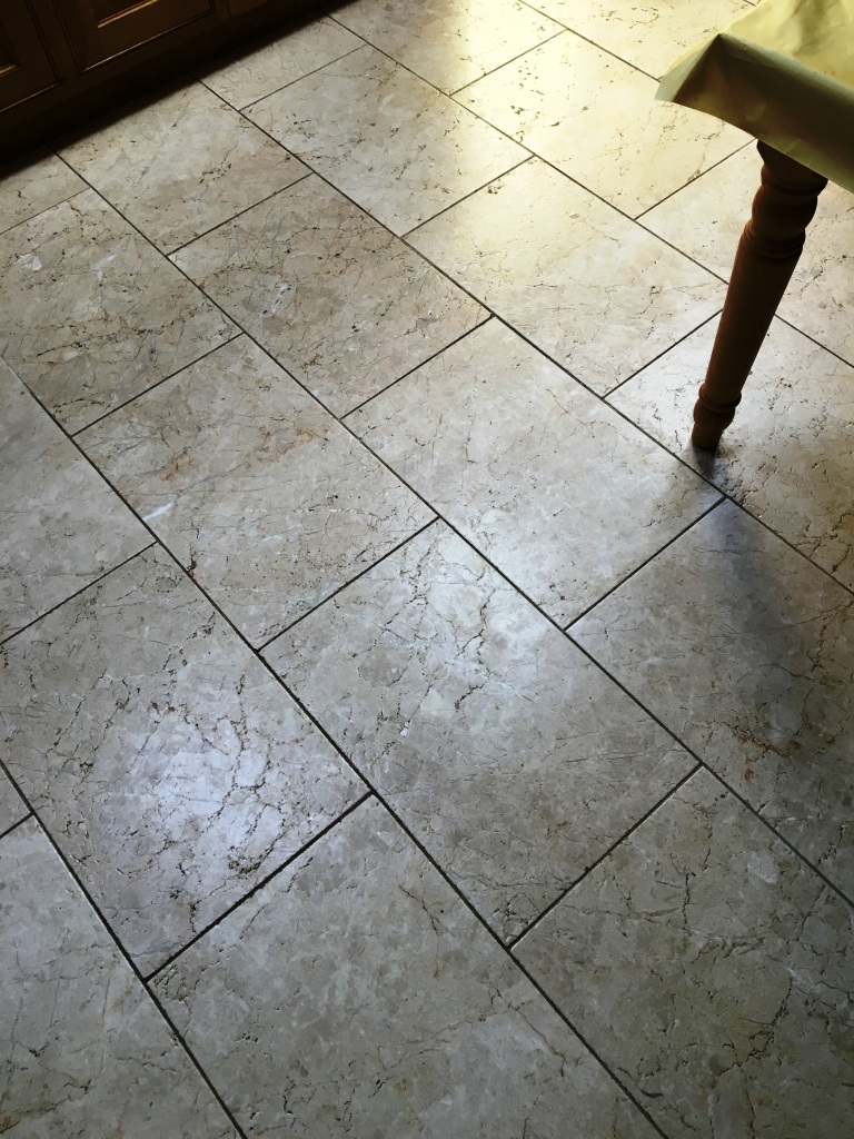 Tumbled Marble floor in Twickenham Before Cleaning